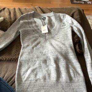 Brand new silver Xpress sweater with tax